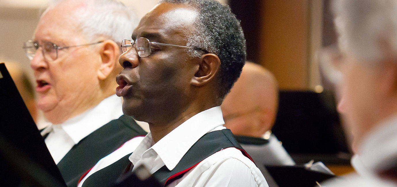 men singing in choir