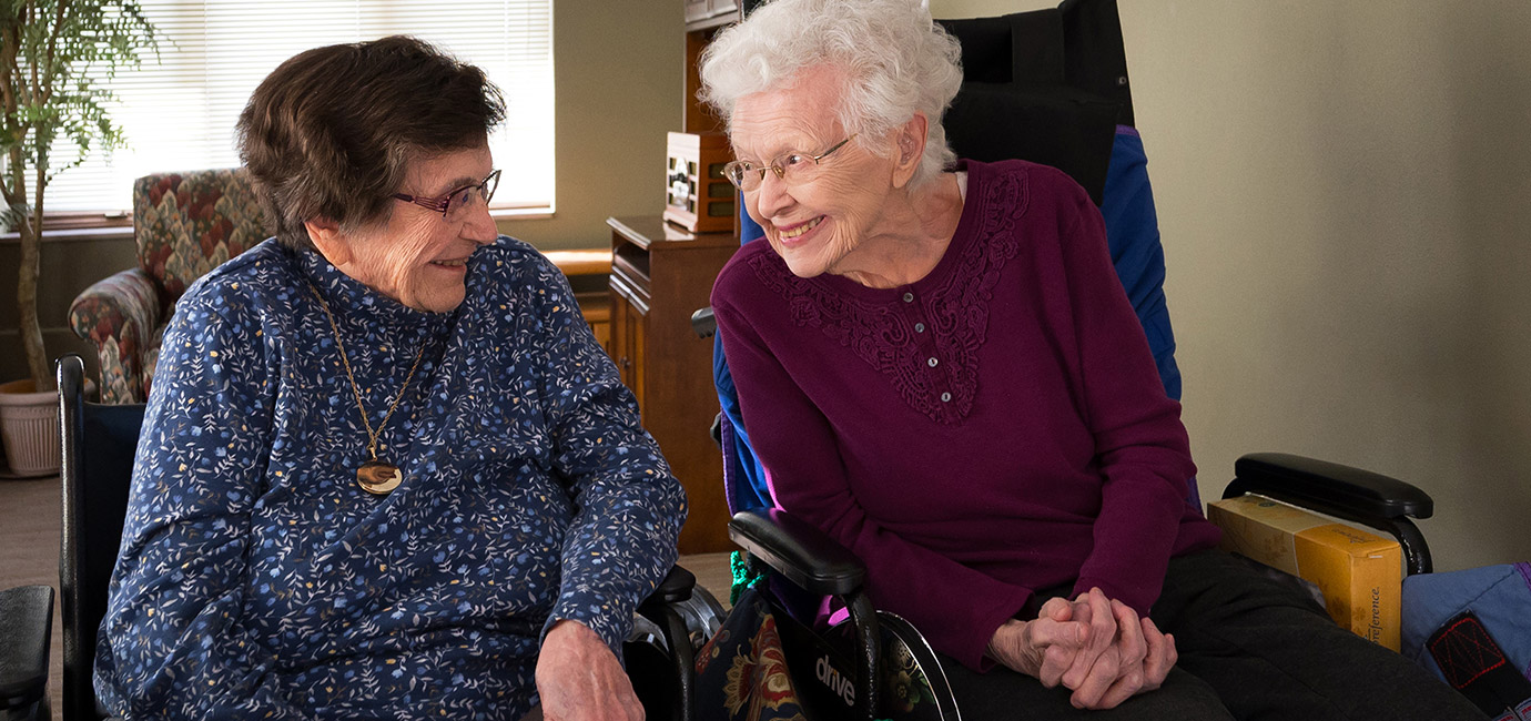 two ladies conversing