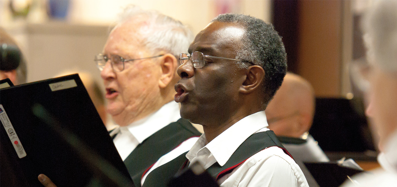 Choir member sings